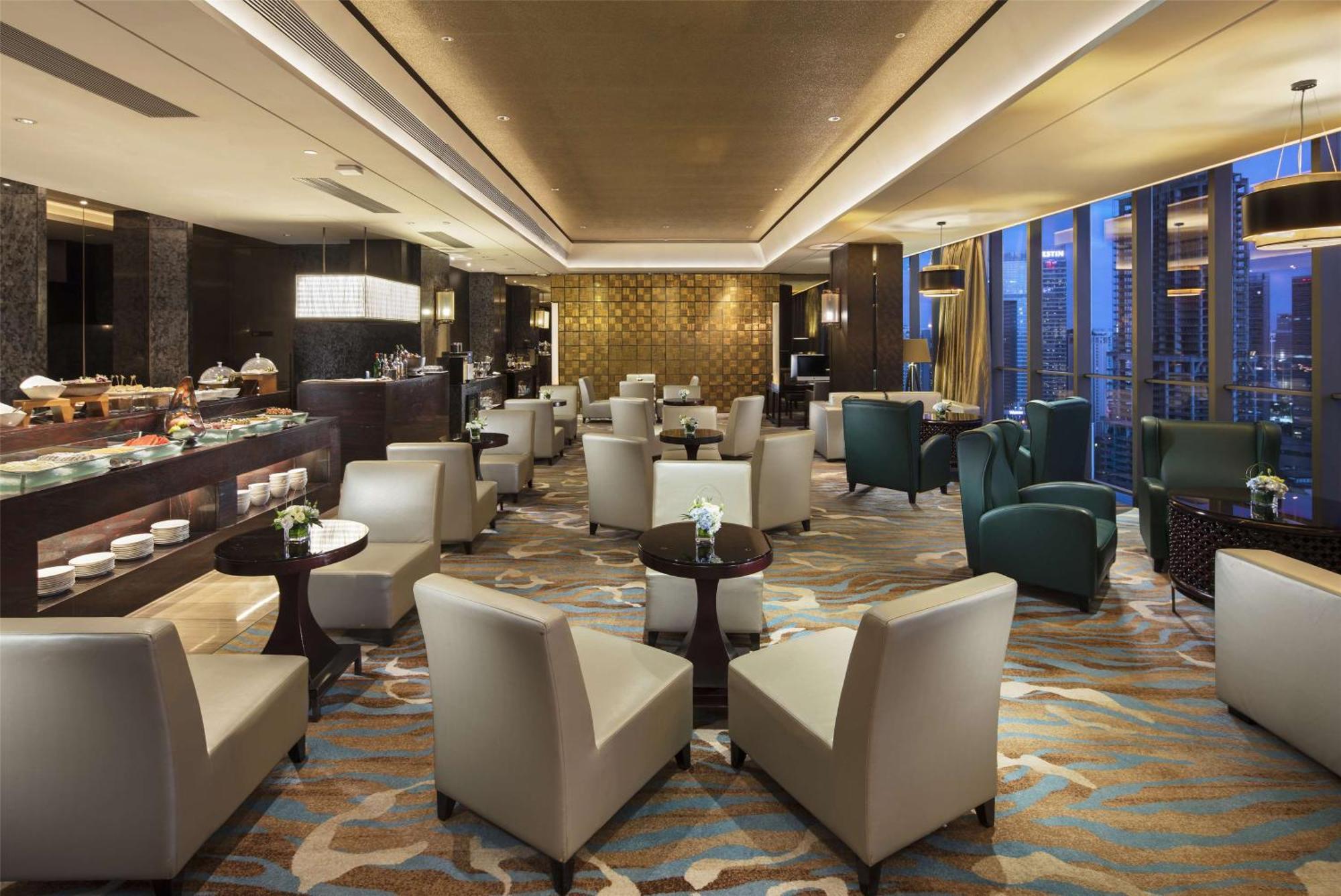 Hilton Guangzhou Tianhe - Free Shuttle Bus And Registration Counter Available During Canton Fair Period Exteriör bild The Club lounge at Beijing Capital International Airport